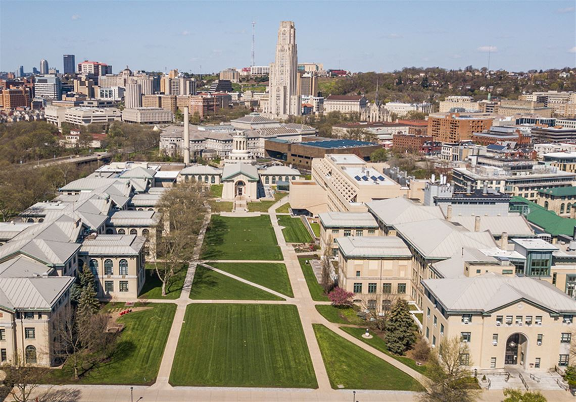 Aerial view of the Carnegie Mellon campus lawn in Oakland with the Cathedral of Learning behind it